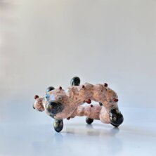Glass bracelet on a white background.