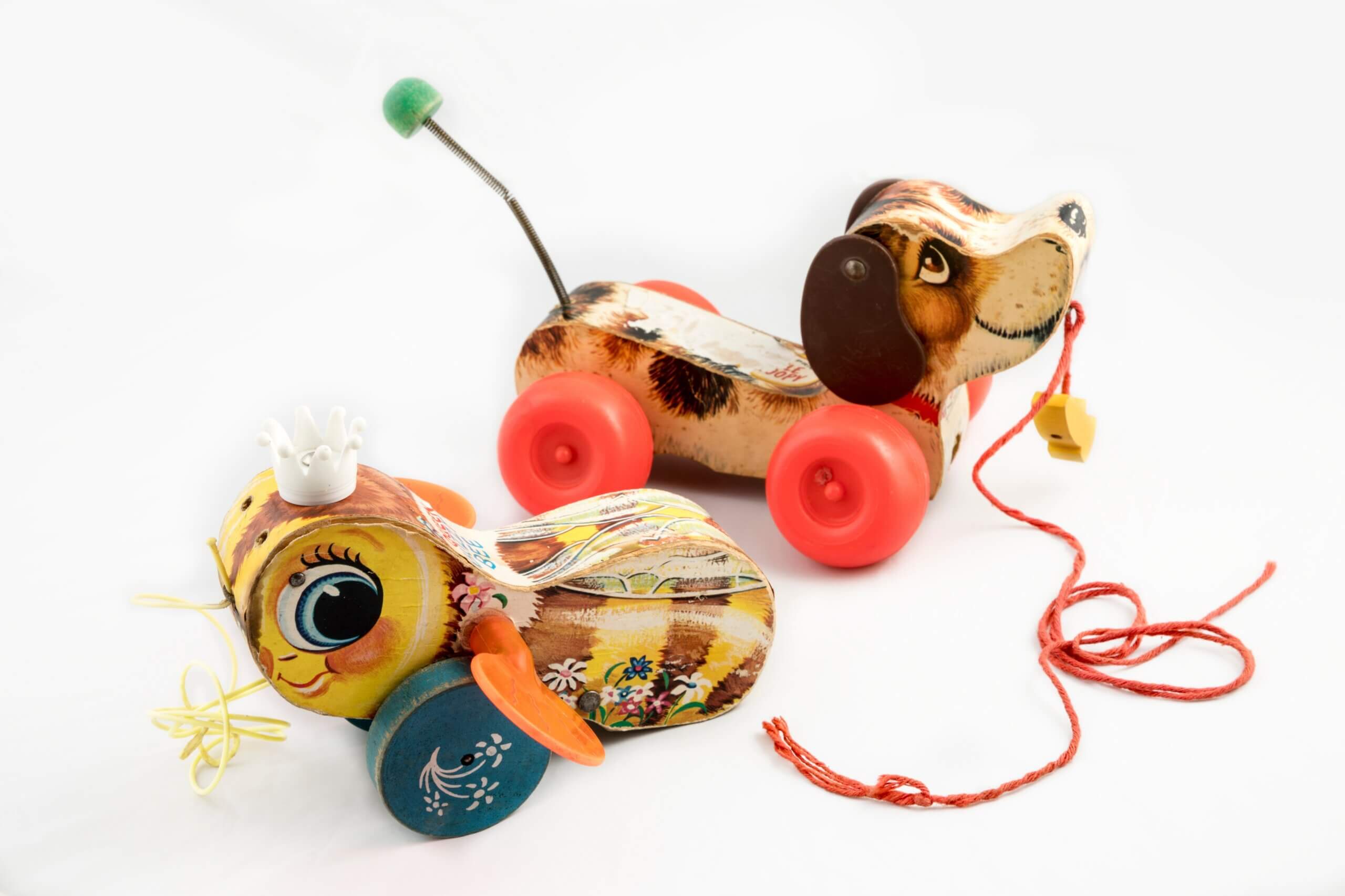 Photo of old-fashioned toys on white background