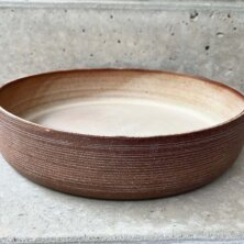 Brown and white clay deep dish.