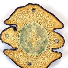 Glazed plate on a white background.